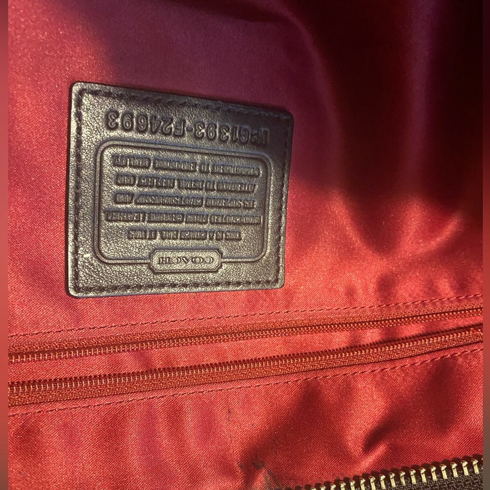 Used Coach shoulder bag grays, black and burgundy